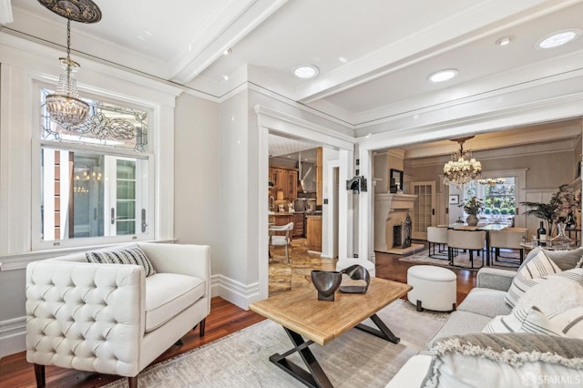 68 Castro St, San Francisco, CA 94114 - living room with a chandelier, wood finished floors, beamed ceiling, crown molding, and recessed lighting