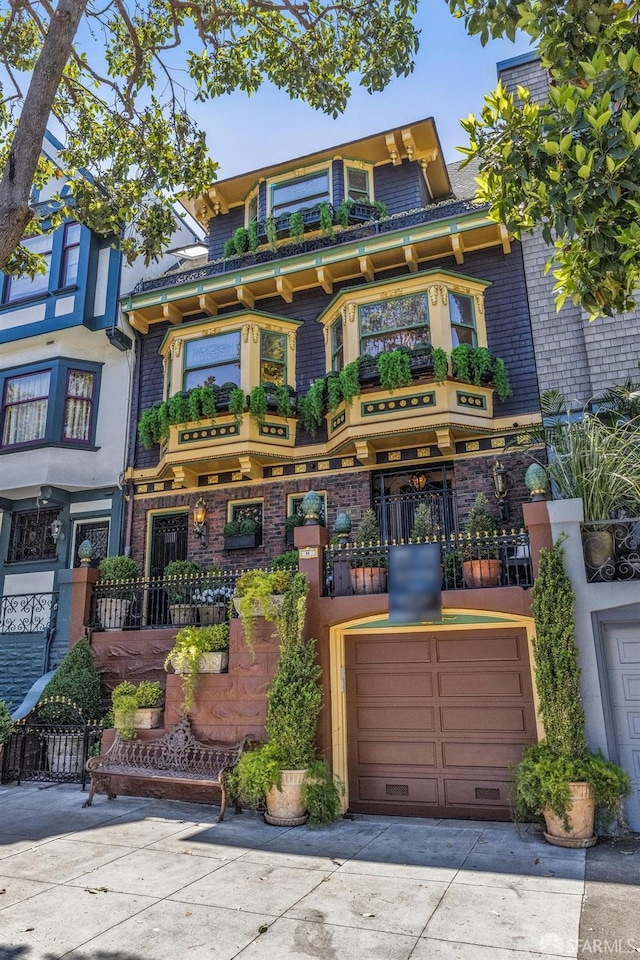 68 Castro St, San Francisco, CA 94114 - view of front of home featuring driveway and brick siding