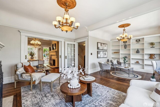68 Castro St, San Francisco, CA 94114 - living room with a chandelier, baseboards, wood finished floors, and ornamental molding