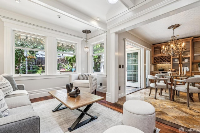68 Castro St, San Francisco, CA 94114 - living area with a chandelier, wood finished floors, baseboards, and crown molding