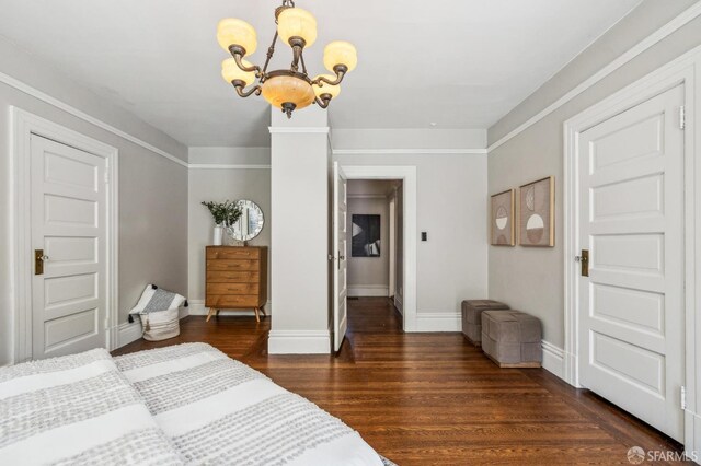 68 Castro St, San Francisco, CA 94114 - bedroom featuring a chandelier, dark wood-type flooring, and baseboards