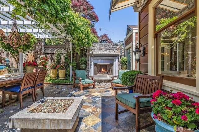 68 Castro St, San Francisco, CA 94114 - view of patio / terrace with an outdoor stone fireplace and a fire pit