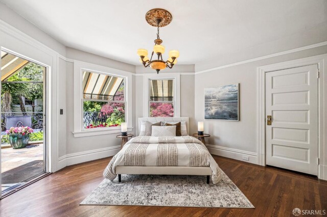 68 Castro St, San Francisco, CA 94114 - bedroom featuring a chandelier, access to outside, baseboards, and dark wood-style flooring
