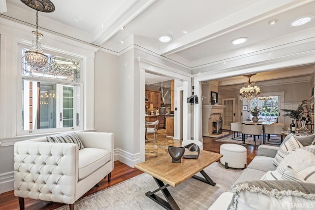 68 Castro St, San Francisco, CA 94114 - living room featuring a chandelier, wood finished floors, beam ceiling, crown molding, and recessed lighting