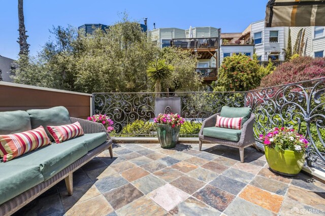 68 Castro St, San Francisco, CA 94114 - view of patio featuring outdoor lounge area and a balcony