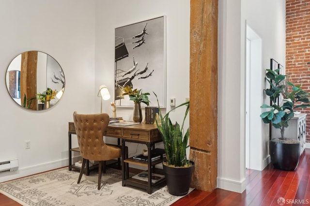 office space with baseboards and hardwood / wood-style floors