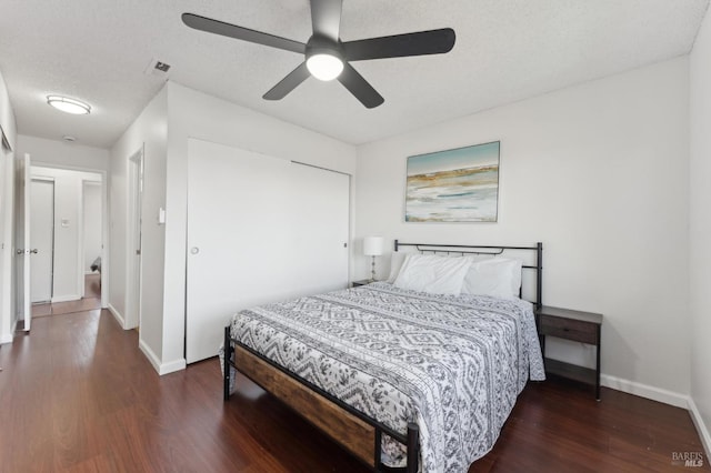 355 Parkview Ter Unit A6, Vallejo, CA 94589 - bedroom featuring ceiling fan, baseboards, wood finished floors, visible vents, and a closet