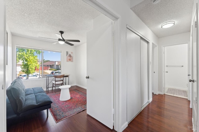355 Parkview Ter Unit A6, Vallejo, CA 94589 - hallway featuring baseboards, a textured ceiling, and wood finished floors