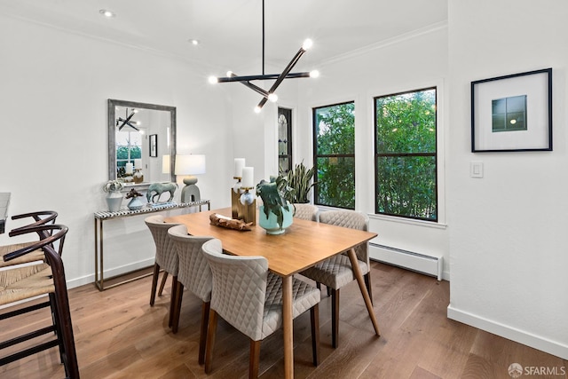 536 Wisconsin St, San Francisco, CA 94107 - dining space with baseboard heating, a chandelier, ornamental molding, light wood-style flooring, and recessed lighting