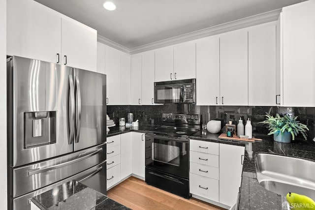 536 Wisconsin St, San Francisco, CA 94107 - kitchen featuring black appliances, backsplash, dark stone counters, crown molding, and white cabinets