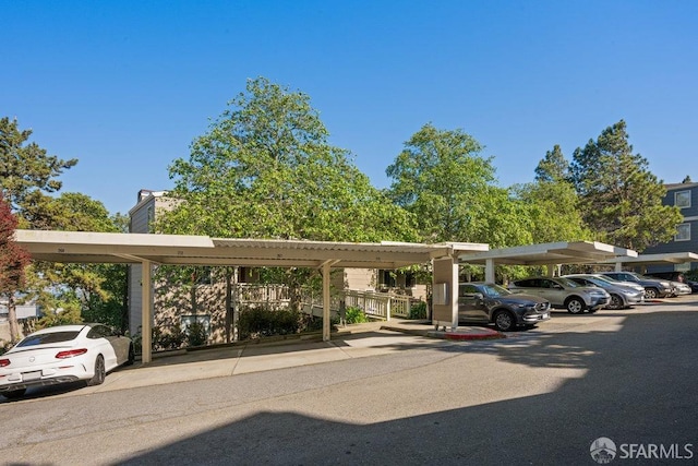 view of partially covered parking lot