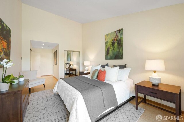 bedroom with wood finished floors