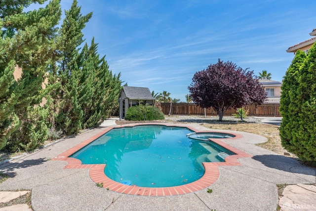 5317 Judsonville Dr, Antioch, CA 94531 - view of pool with a fenced backyard, an outbuilding, and a pool with connected hot tub