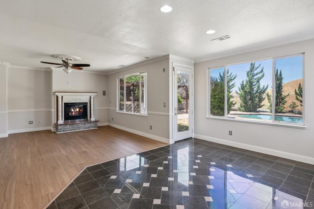 5317 Judsonville Dr, Antioch, CA 94531 - unfurnished living room with plenty of natural light, baseboards, a textured ceiling, a ceiling fan, and granite floors