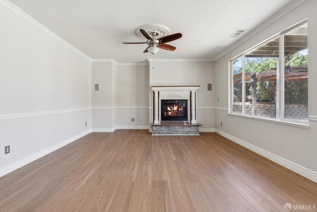 5317 Judsonville Dr, Antioch, CA 94531 - unfurnished living room featuring wood finished floors, ceiling fan, a glass covered fireplace, baseboards, and crown molding