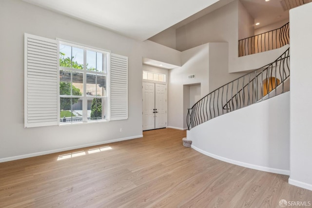 5317 Judsonville Dr, Antioch, CA 94531 - foyer entrance featuring baseboards, stairway, wood finished floors, recessed lighting, and a high ceiling