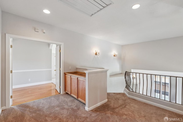 5317 Judsonville Dr, Antioch, CA 94531 - hall with light carpet, an upstairs landing, attic access, baseboards, and recessed lighting