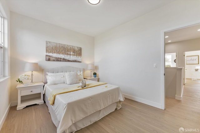 bedroom featuring light wood-type flooring