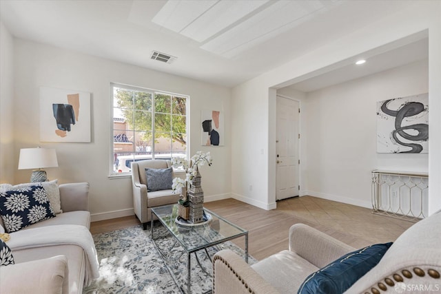 living room with light hardwood / wood-style floors