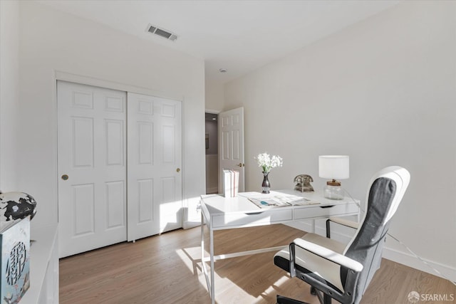 office featuring light hardwood / wood-style floors