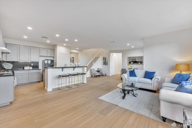 living room featuring light wood-type flooring