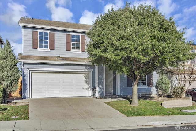 view of front of property featuring a garage