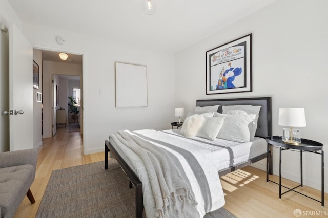 bedroom featuring light wood-type flooring