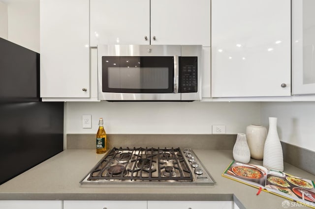 kitchen with white cabinets and stainless steel appliances