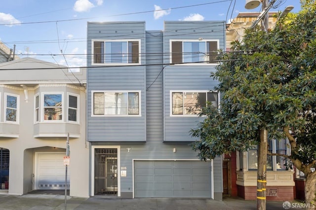 view of property featuring a garage