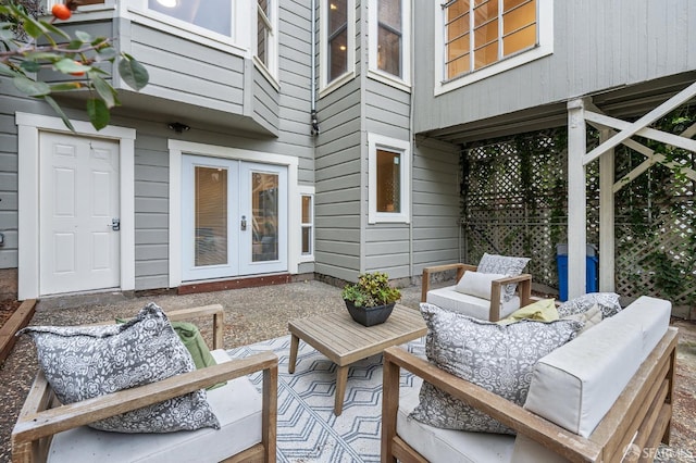 view of patio with outdoor lounge area and french doors