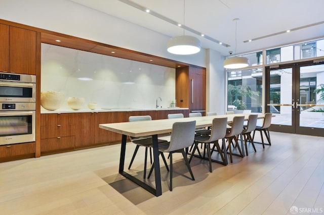 dining room featuring light wood-type flooring