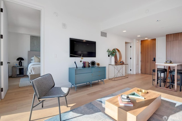 2177 3rd St Unit 422, San Francisco, CA 94107 - living area with light wood-style flooring and recessed lighting