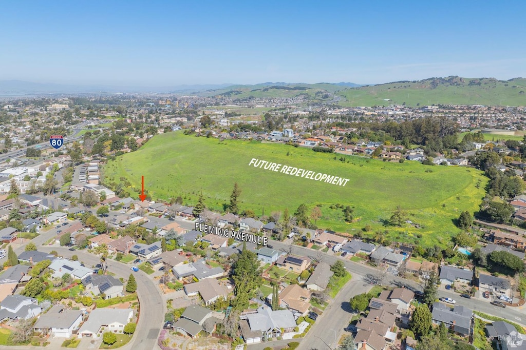 602 Fleming Ave E, Vallejo, CA 94591 - aerial view of property and surrounding area featuring nearby suburban area and a mountainous background