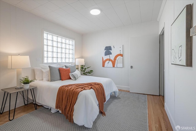 bedroom with light wood-style flooring