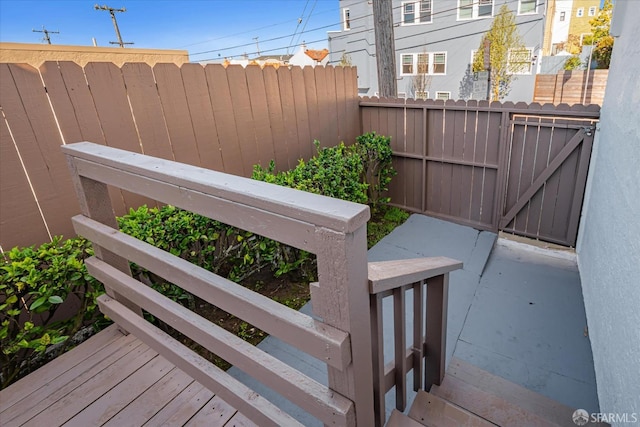 exterior space featuring fence and a gate