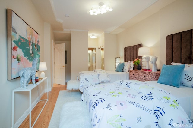 bedroom featuring light wood-type flooring