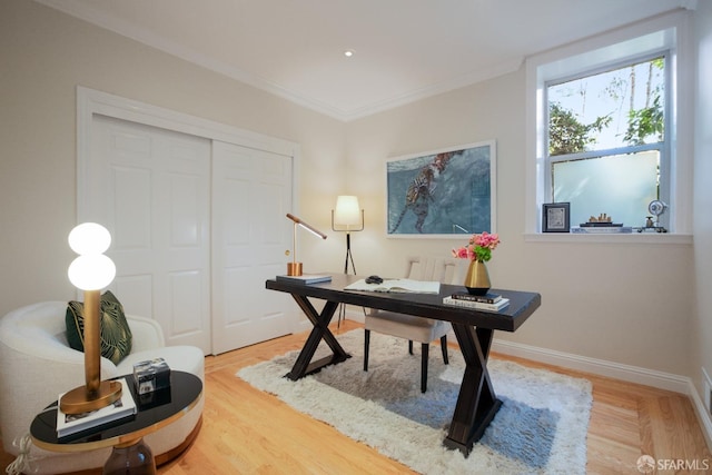 office area featuring ornamental molding and hardwood / wood-style flooring