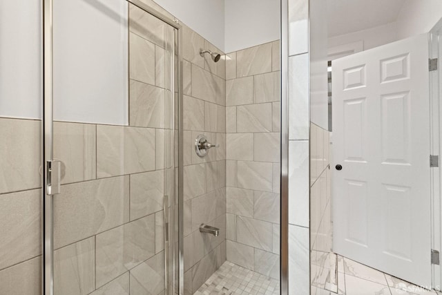 bathroom with an enclosed shower