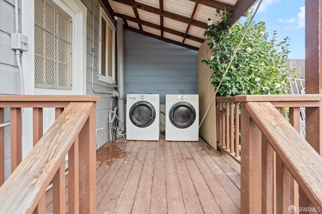 wooden deck with washer and dryer