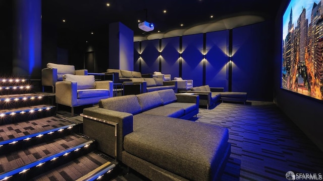 home theater room with carpet floors and a bowling alley