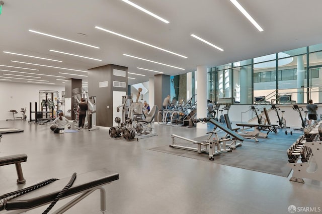 exercise room with a wall of windows