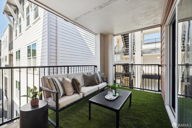 balcony featuring an outdoor living space