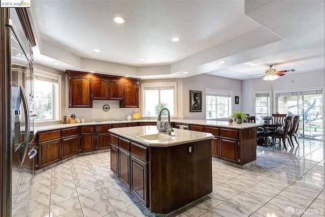 2220 Sunset Pt, Discovery Bay, CA 94505 - kitchen featuring a center island with sink, a sink, light countertops, healthy amount of natural light, and recessed lighting