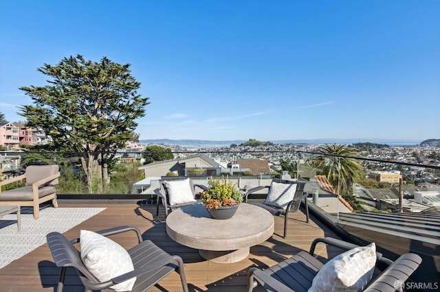 wooden terrace featuring a residential view