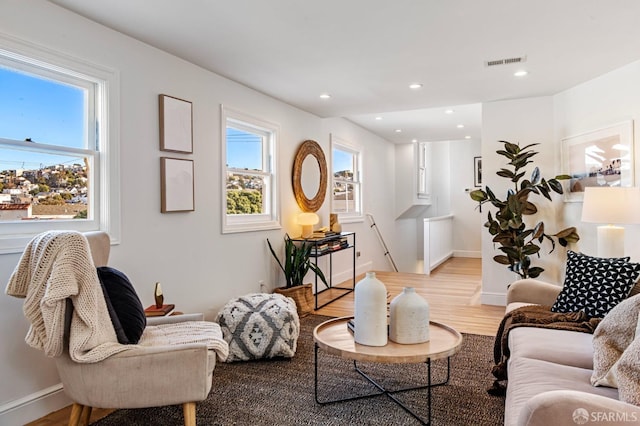 sitting room with light hardwood / wood-style flooring