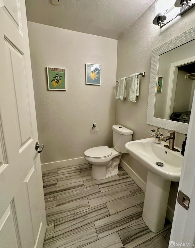 139 Hall Ln, Walnut Creek, CA 94597 - half bathroom with toilet and a textured ceiling