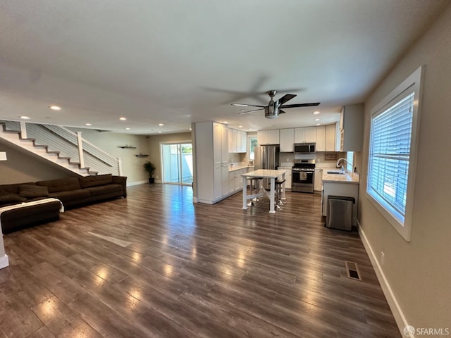 139 Hall Ln, Walnut Creek, CA 94597 - living room with baseboards, stairs, a ceiling fan, dark wood finished floors, and recessed lighting