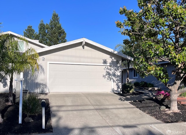 139 Hall Ln, Walnut Creek, CA 94597 - view of front of house with a garage and concrete driveway