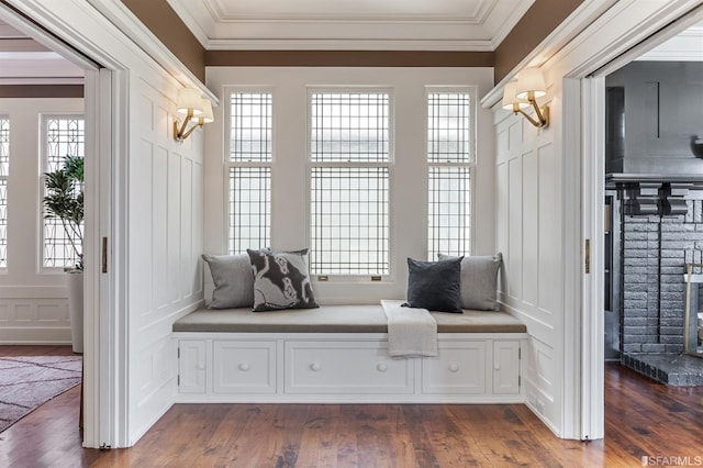 mudroom featuring dark hardwood / wood-style flooring and crown molding