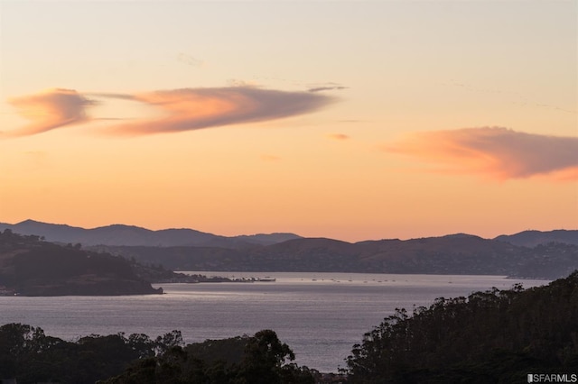 property view of mountains featuring a water view